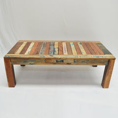 a wooden bench sitting on top of a snow covered ground  a wooden bench sitting on top of a snow covered ground