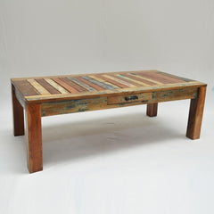 a wooden bench sitting in the snow  a wooden bench sitting in the snow