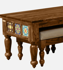 Shanti Surprise Sheesham Wood Nesting Coffee Table Set in Provincial Teak Finish With Cushioned Stools Shanti Surprise Sheesham Wood Nesting Coffee Table Set in Provincial Teak Finish With Cushioned Stools