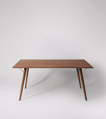 The Gileteen Solid Wood Six-Seater Dining Table with fine Contemporary Legs