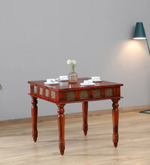 Shanti Surprise Sheesham Wood 4 Seater Dining Table In Scratch Resistant Honey Oak Finish With Brass Cladding