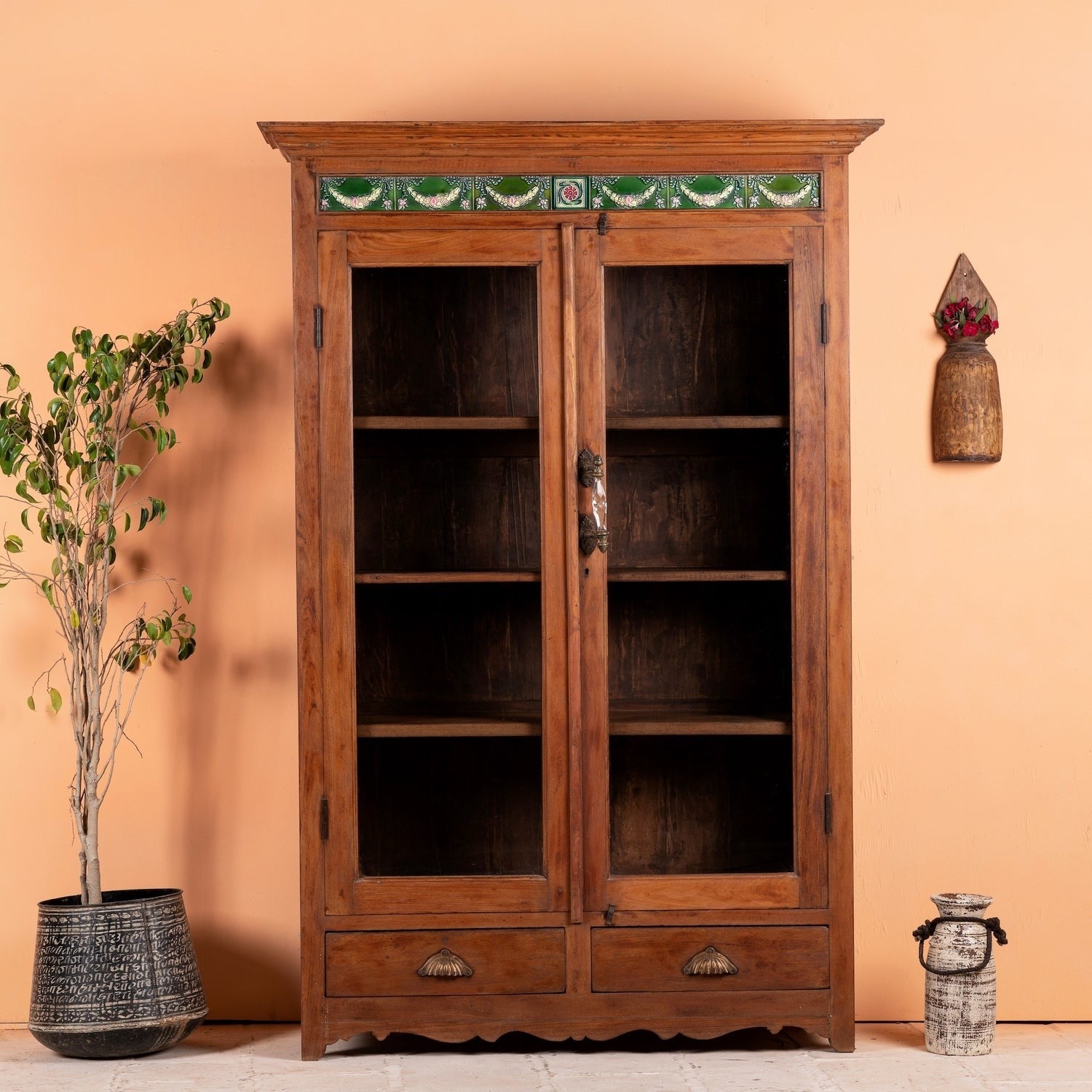 a wooden dresser with a mirror in it 