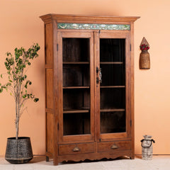 a wooden door with a cat sitting in it 