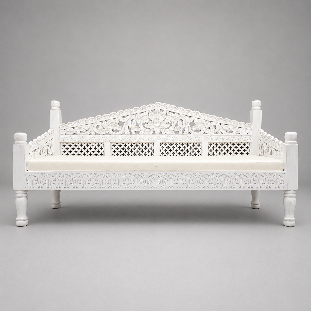 Large whitewash Indian wooden daybed with ornate floral carving