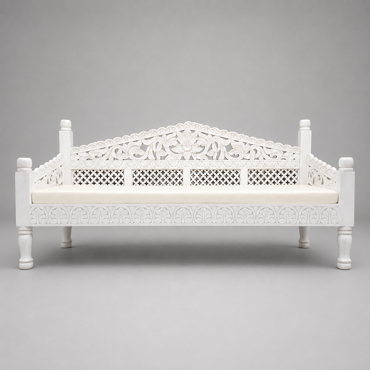 Large whitewash Indian wooden daybed with ornate floral carving